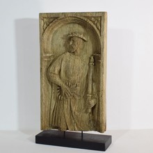 Carved oak panel with a nobleman, France circa 1550-1650