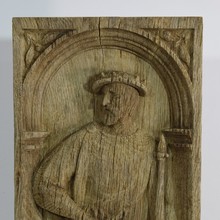 Carved oak panel with a nobleman, France circa 1550-1650