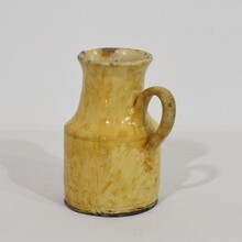Yellow glazed earthenware water jug, France circa 1850-1900