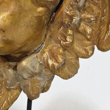 Baroque carved giltwood winged angel head, France circa 1700-1750