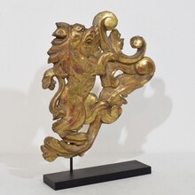 Hand carved gilt wood standing lion on curl, France circa 1750