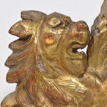 Hand carved gilt wood standing lion on curl, France circa 1750