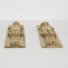 Pair of wooden baroque panels with caryatids, France circa 1750