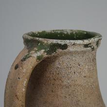 Beautiful primitive earthenware pitchers, France circa 1800-1850