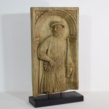 Carved oak panel with a nobleman, France circa 1550-1650