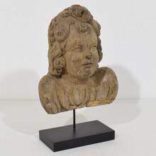 Baroque carved oak angel head on wings, France circa 1650-1700