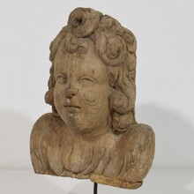 Baroque carved oak angel head on wings, France circa 1650-1700