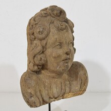 Baroque carved oak angel head on wings, France circa 1650-1700