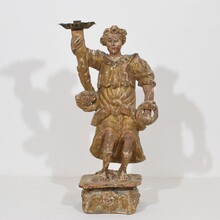 Baroque angel figure with candleholder, Italy circa 1650-1700