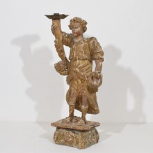 Baroque angel figure with candleholder, Italy circa 1650-1700