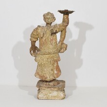 Baroque angel figure with candleholder, Italy circa 1650-1700