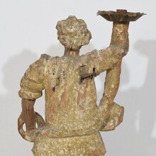 Baroque angel figure with candleholder, Italy circa 1650-1700