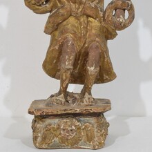 Baroque angel figure with candleholder, Italy circa 1650-1700