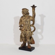 Baroque angel figure with candleholder, Italy circa 1650-1700