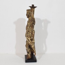 Baroque angel figure with candleholder, Italy circa 1650-1700