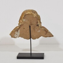 Baroque carved giltwood angel head on wings, Italy circa 1750
