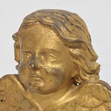 Baroque carved giltwood angel head on wings, Italy circa 1750