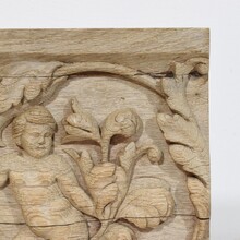 Carved oak panel depicting an angel on an acanthus curl, France circa 1750