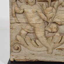 Carved oak panel depicting an angel on an acanthus curl, France circa 1750