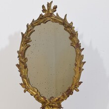 Carved giltwood baroque standing mirror, Italy circa 1750