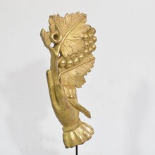 Giltwood hand holding a branch of grapes, Italy circa 1750