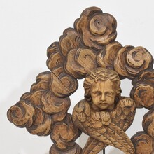 Carved oak winged angel head in clouds ornament, France circa 1800-1850