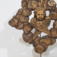 Carved oak winged angel head in clouds ornament, France circa 1800-1850
