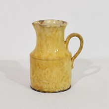 Yellow glazed earthenware water jug, France circa 1850-1900