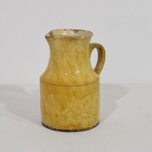 Yellow glazed earthenware water jug, France circa 1850-1900