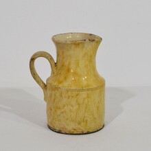 Yellow glazed earthenware water jug, France circa 1850-1900