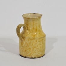 Yellow glazed earthenware water jug, France circa 1850-1900