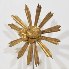 Baroque style giltwood sunburst with angelheads, Italy circa 1880-1900