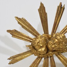 Baroque style giltwood sunburst with angelheads, Italy circa 1880-1900