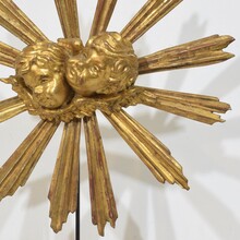 Baroque style giltwood sunburst with angelheads, Italy circa 1880-1900