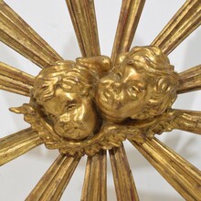 Baroque style giltwood sunburst with angelheads, Italy circa 1880-1900
