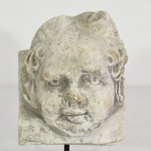 Carved stone angel head ornament, France circa 1650-1750