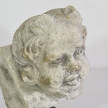 Carved stone angel head ornament, France circa 1650-1750