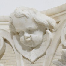 Carved white marble capital with angel head, France circa 1750