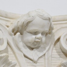 Carved white marble capital with angel head, France circa 1750