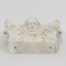 Carved white marble capital with angel head, France circa 1750