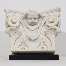 Carved white marble capital with angel head, France circa 1750