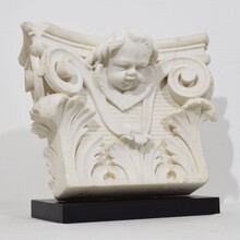 Carved white marble capital with angel head, France circa 1750