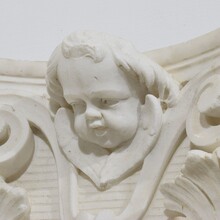 Carved white marble capital with angel head, France circa 1750