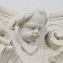 Carved white marble capital with angel head, France circa 1750