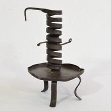 Hand forged iron rat de cave candleholder, France 18th century.