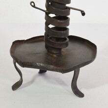 Hand forged iron rat de cave candleholder, France 18th century.