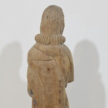 Hand carved oak statue of saint John the evangelist, France circa 1550-1650