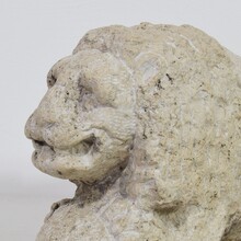 Carved stone lion holding a ball, Italy circa 1650-1750