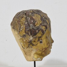 Carved giltwood baroque angel head, Italy circa 1650-1750