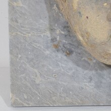 Carved stone cherub fountain head on marble panel, Italy circa 1650-1750